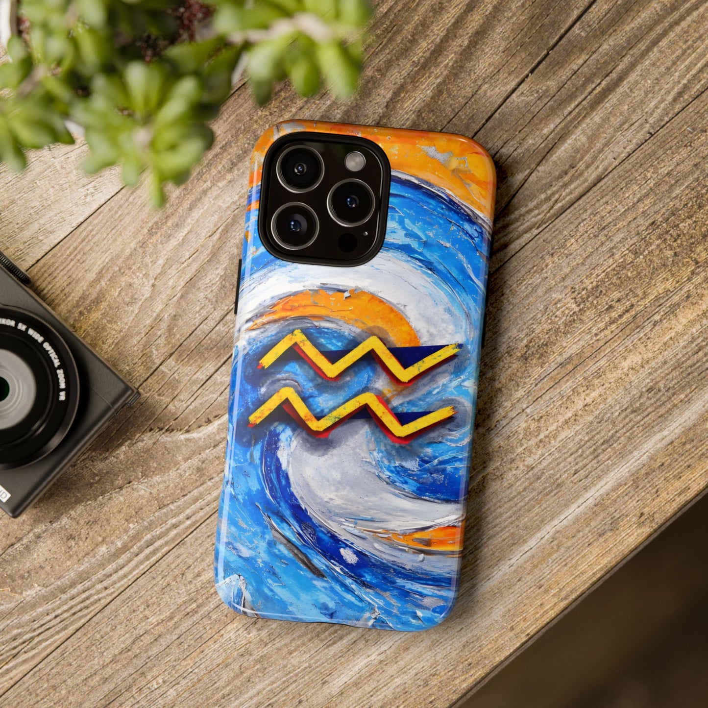 Aquarius zodiac phone case featuring vibrant blue swirling artwork, orange accents, and a bold Aquarius symbol on a protective glossy phone case.