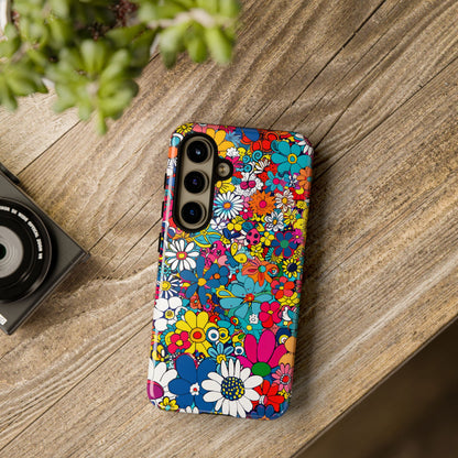 Retro Flowers phone case featuring a vibrant collage of colorful floral illustrations in a playful vintage-inspired design, celebrating creativity, joy, and timeless flower power style.